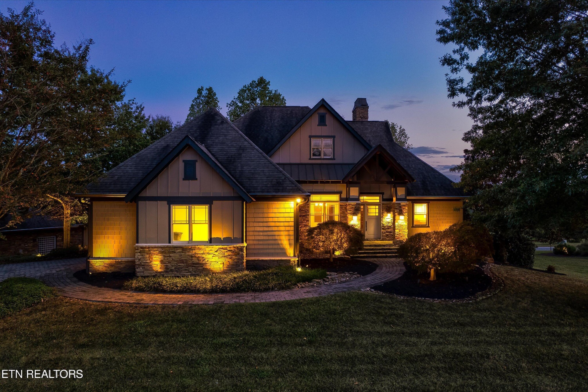 494 Chestnut Lane Loudon, TN 37774 - Photo 2 of 58 a front view of a house with a garden and yard