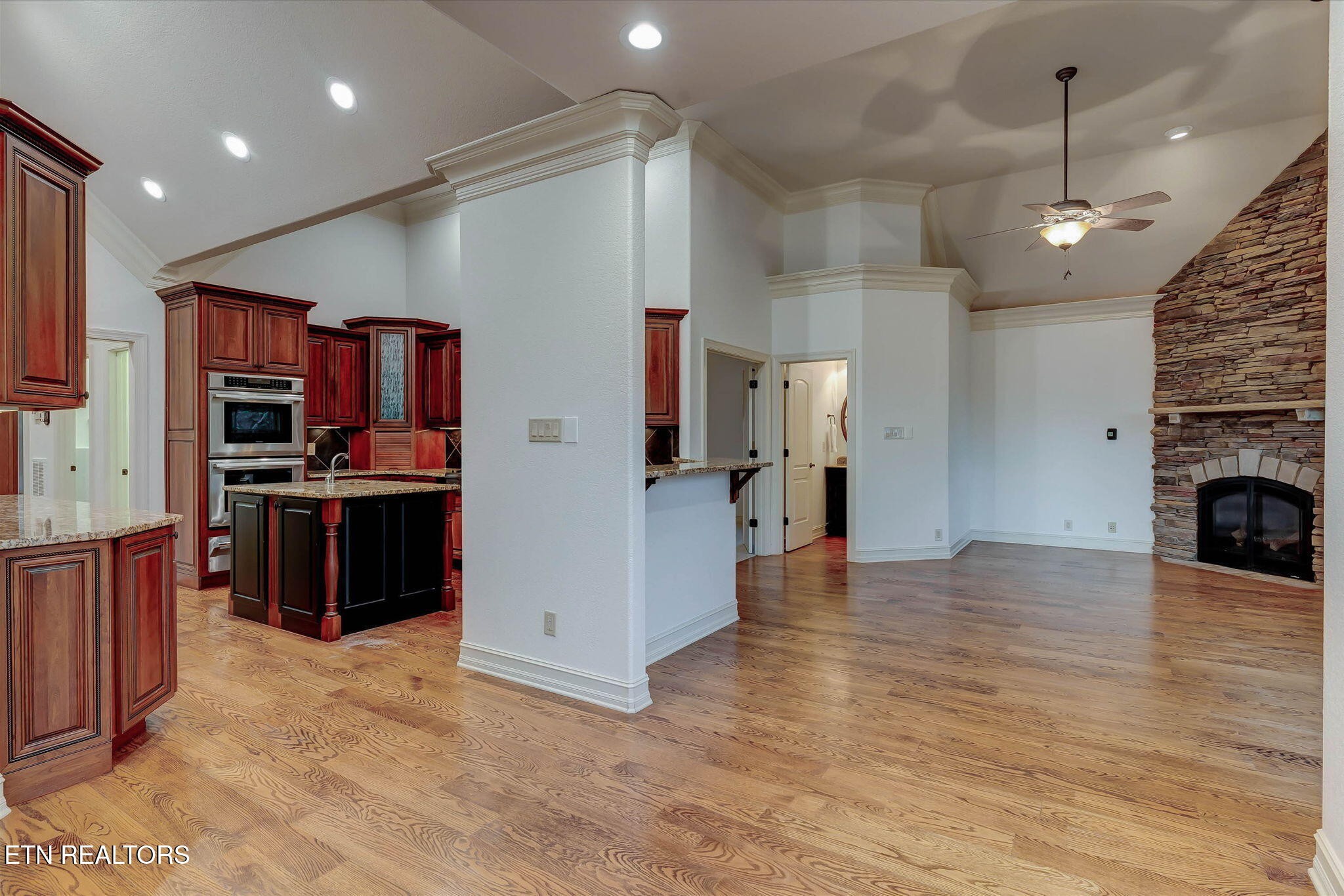 494 Chestnut Lane Loudon, TN 37774 - Photo 22 of 58 a view of kitchen with stainless steel appliances kitchen island granite countertop a refrigerator and a stove top oven