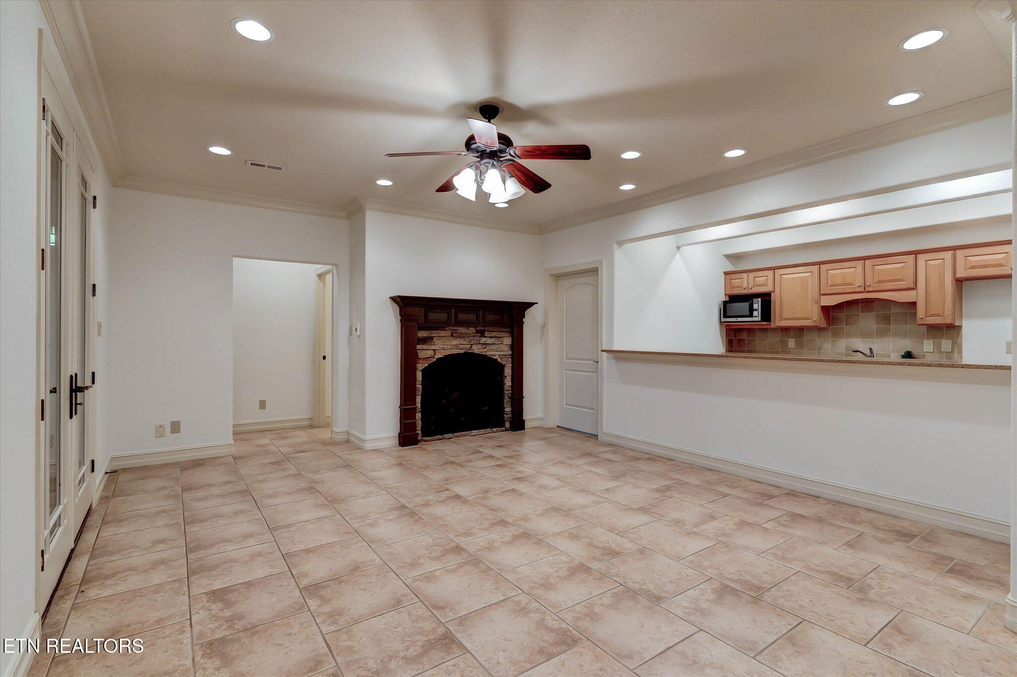 494 Chestnut Lane Loudon, TN 37774 - Photo 38 of 58 a view of an empty room with a fireplace