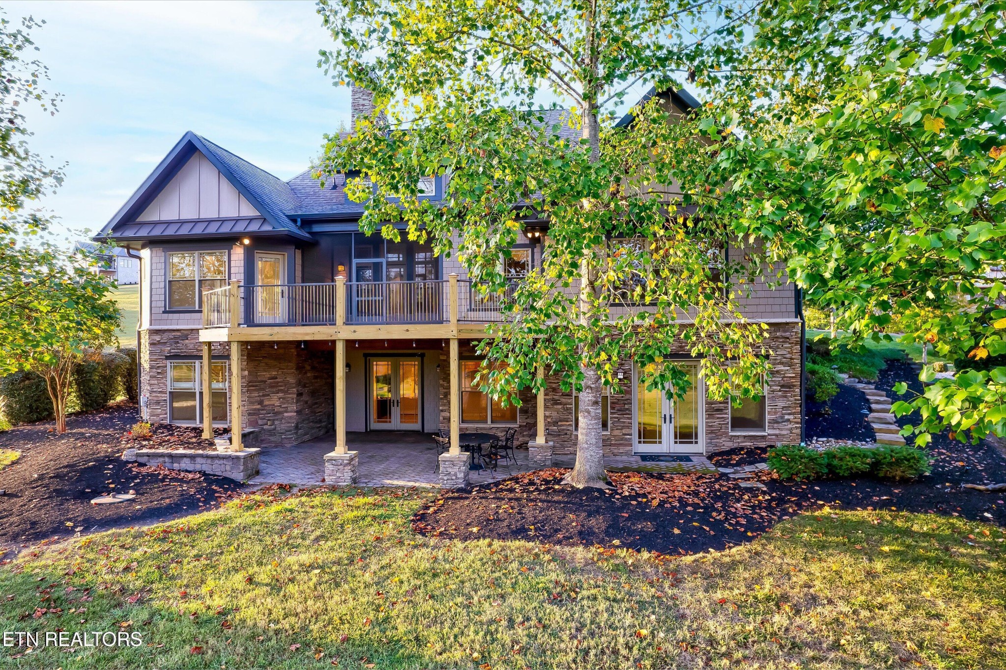 494 Chestnut Lane Loudon, TN 37774 - Photo 4 of 58 a front view of a house with a garden
