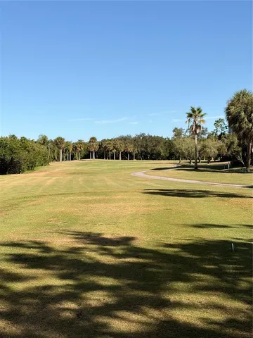 a view of a swimming pool and an outdoor space