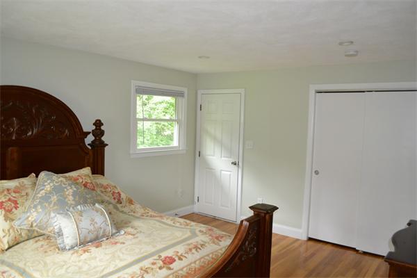 6 Barrett Road Lexington, MA 02421 - Photo 11 of 20 a bedroom with a bed and a window
