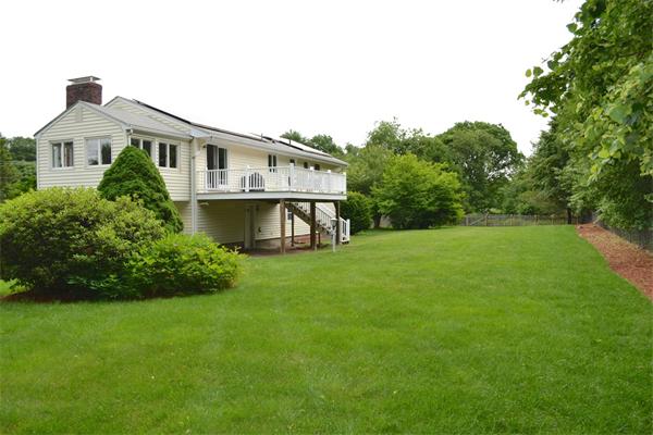 6 Barrett Road Lexington, MA 02421 - Photo 20 of 20 a front view of a house with a yard