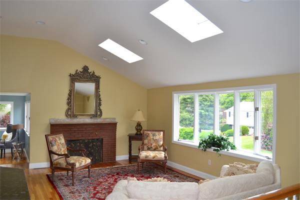 6 Barrett Road Lexington, MA 02421 - Photo 6 of 20 a living room with furniture and a fireplace