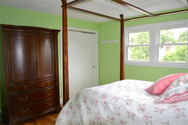 6 Barrett Road Lexington, MA 02421 - Photo 8 of 20 a bedroom with a bed and a window