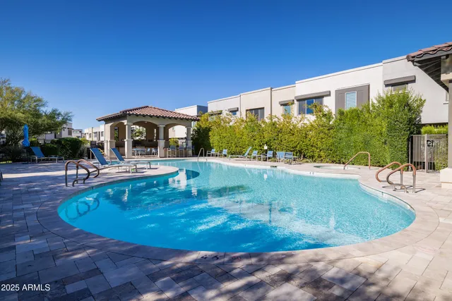 a view of a house with a swimming pool