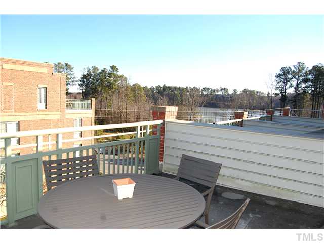 1230 Capability Drive, Unit 103 Raleigh, NC 27606 - Photo 16 of 18 Third floor rooftop porch with view of Lake Raleigh