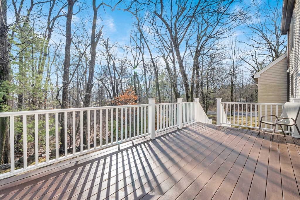 315 Candlestick Road North Andover, MA 01845 - Photo 42 of 42 a view of deck with wooden floor and fence