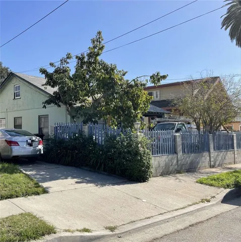 a view of a house with a garden