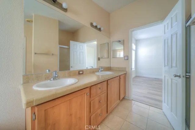 a kitchen with a stove top oven sink and cabinets