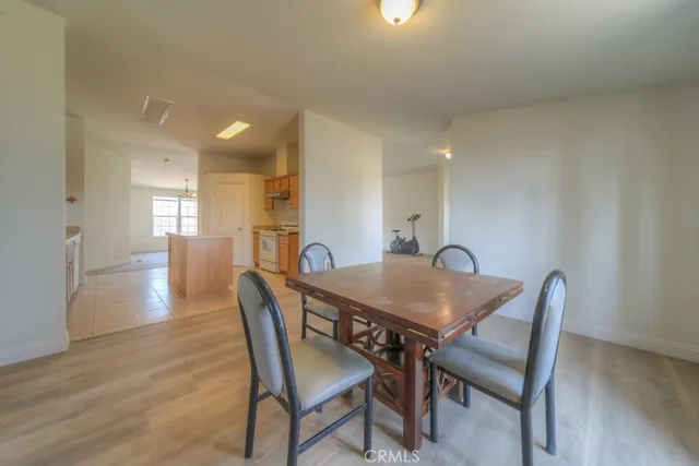 a view of a livingroom with a ceiling fan and window