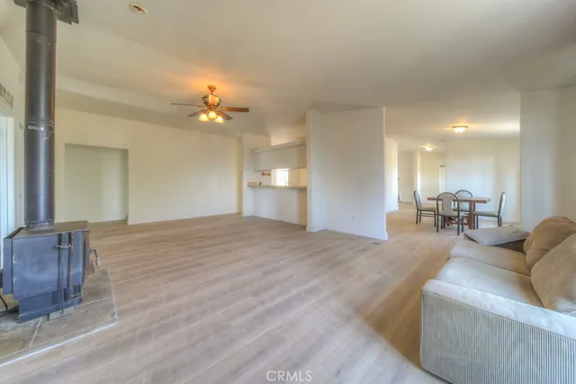 a bathroom with a sink vanity and a toilet