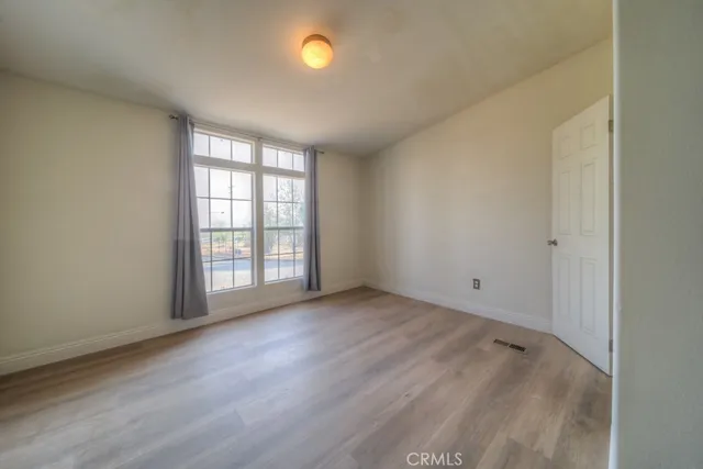a view of an ocean beach and mountain