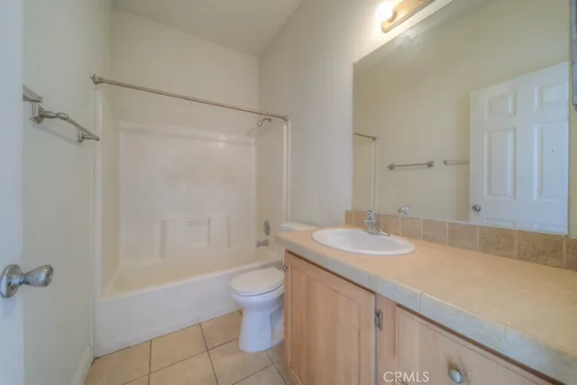 a view of swimming pool with outdoor space and seating area