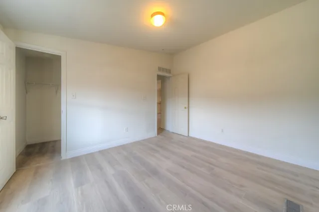 a view of an empty room with a balcony