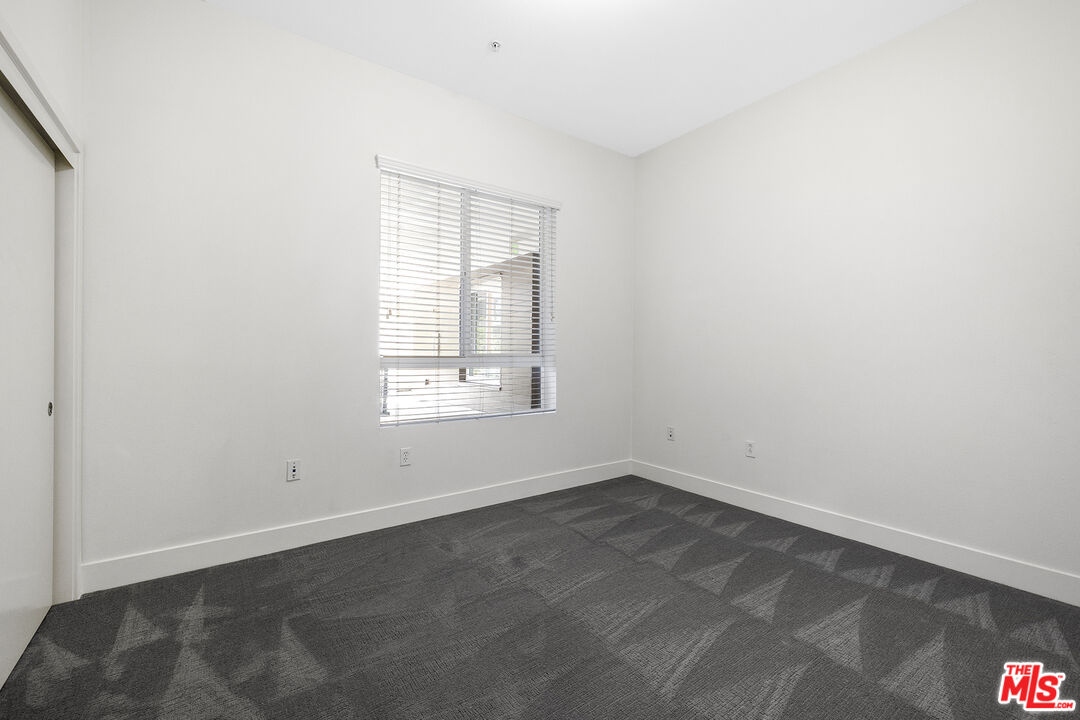 12920 West Runway Road, Unit 222 Playa Vista, CA 90094 - Photo 12 of 23 an empty room with a window