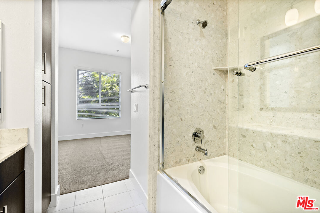 12920 West Runway Road, Unit 222 Playa Vista, CA 90094 - Photo 14 of 23 a bathroom with a bathtub and shower