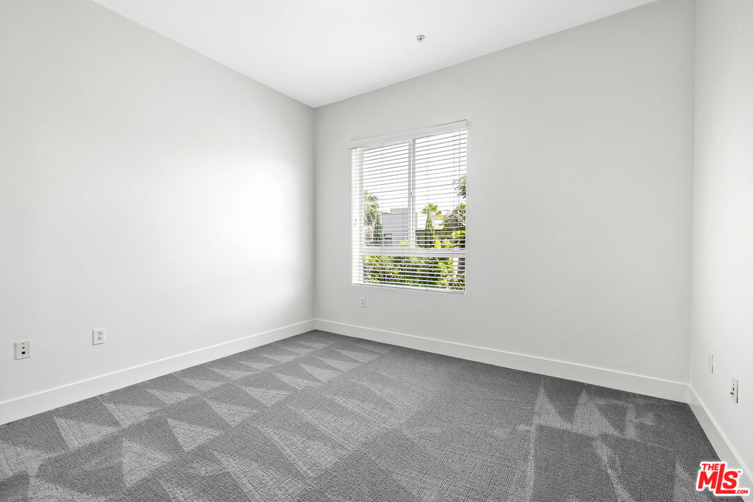 12920 West Runway Road, Unit 222 Playa Vista, CA 90094 - Photo 15 of 23 an empty room with windows