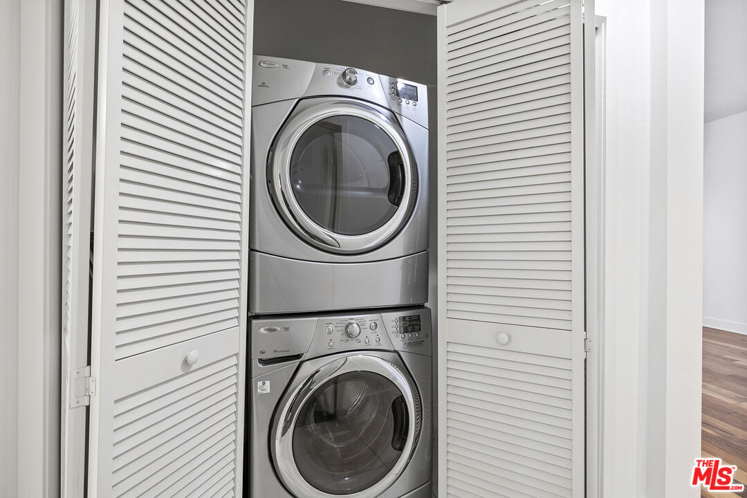 12920 West Runway Road, Unit 222 Playa Vista, CA 90094 - Photo 17 of 23 a utility room with dryer and washer