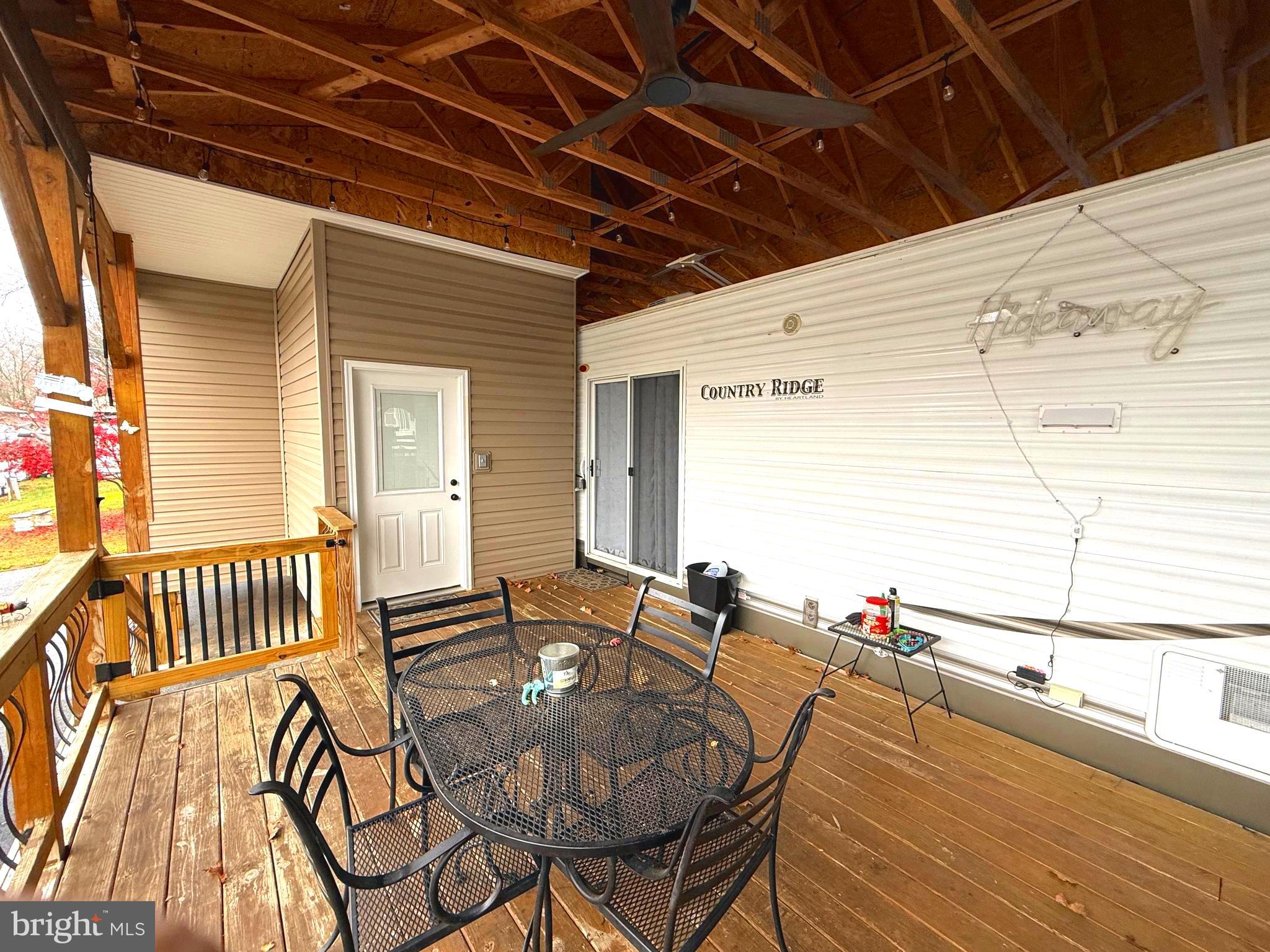 9 & 10 Jollywood Road Falling Waters, WV 25419 - Photo 5 of 10 a outdoor space with chairs