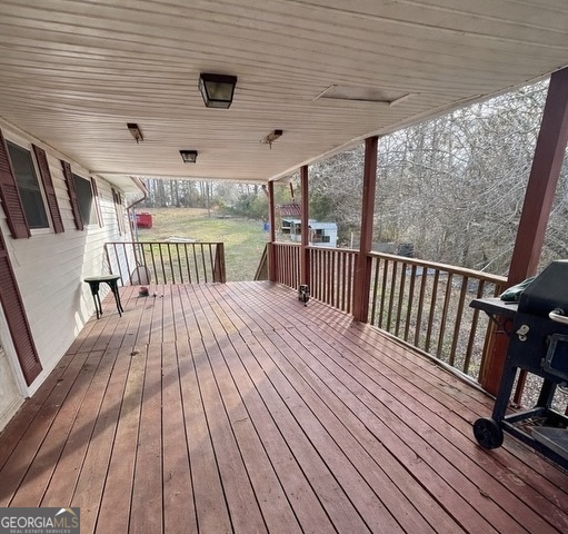 74 Hanshaw Drive Rock Spring, GA 30739 - Photo 12 of 13 a view of a balcony with wooden floor