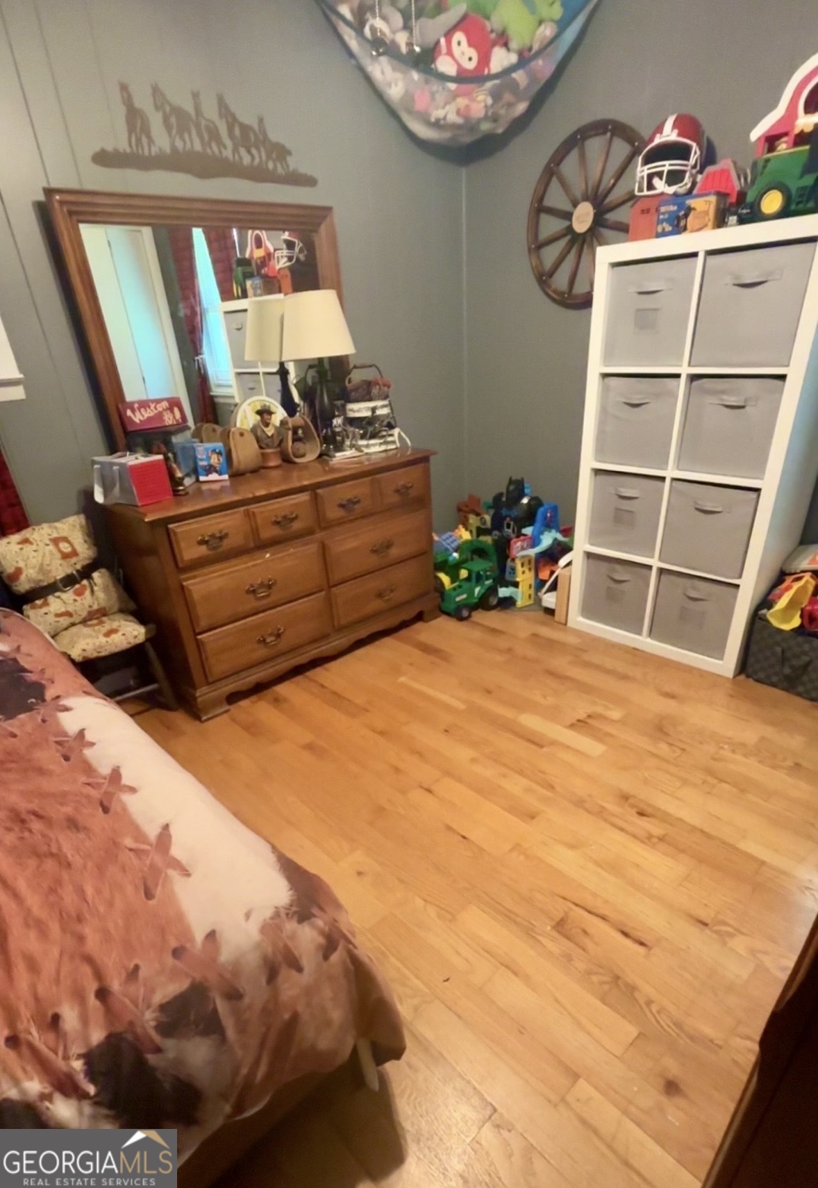 74 Hanshaw Drive Rock Spring, GA 30739 - Photo 7 of 13 a bed room with a bed and a chair