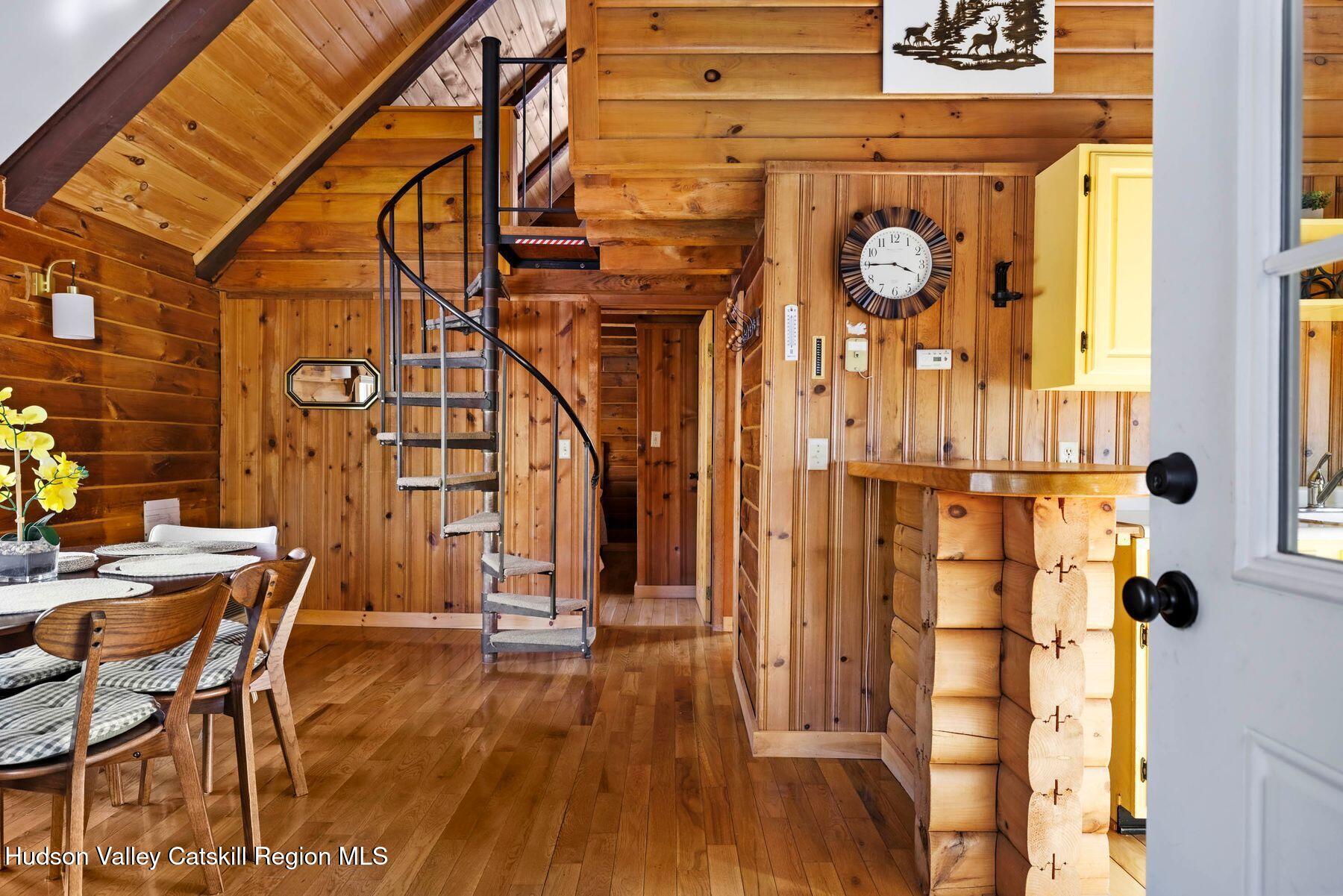 191 Mill Road Margaretville, NY 12455 - Photo 12 of 26 Dining Area with Spiral Staircase