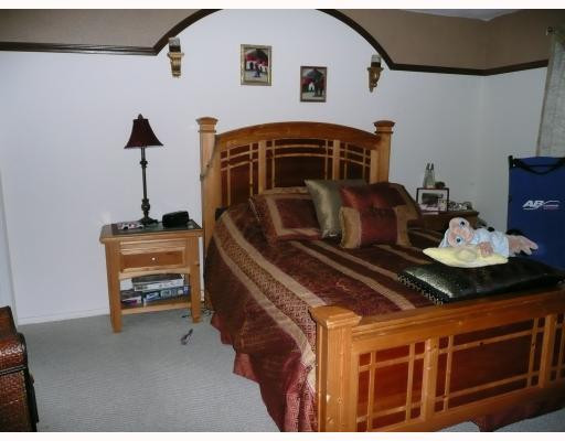 7900 South Colony Circle, Unit 105 Tamarac, FL 33321 - Photo 4 of 7 Master Bedroom