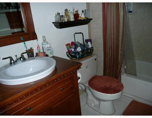7900 South Colony Circle, Unit 105 Tamarac, FL 33321 - Photo 5 of 7 Master Bedroom