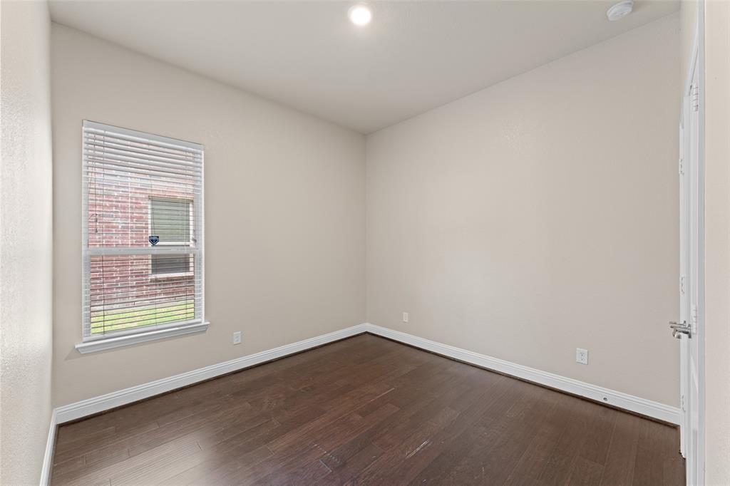 600 Fishback Circle Plano, TX 75074 - Photo 12 of 38 an empty room with a window