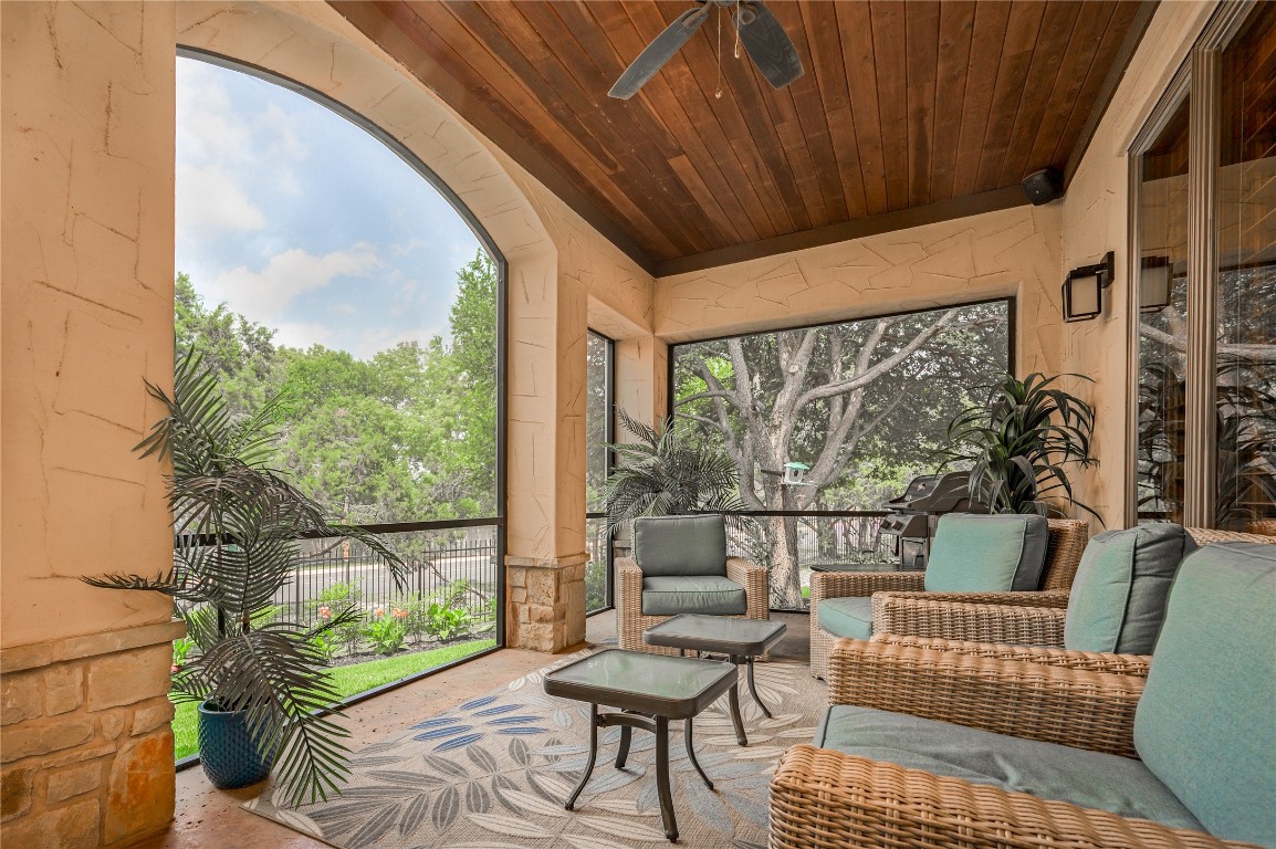 22 Borello Drive Austin, TX 78738 - Photo 23 of 26 a outdoor living space with furniture and a potted plant