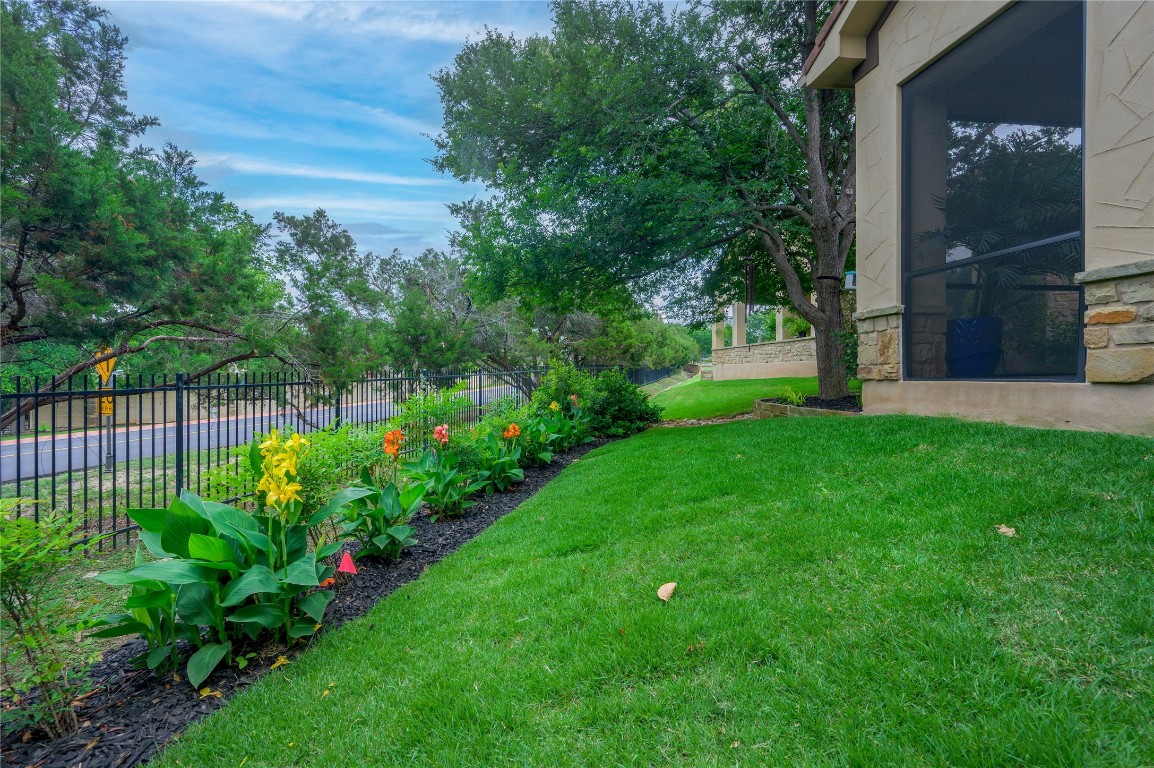 22 Borello Drive Austin, TX 78738 - Photo 25 of 26 a view of a garden