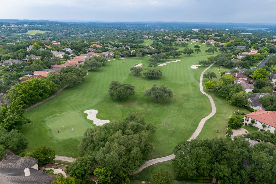 22 Borello Drive Austin, TX 78738 - Photo 5 of 26 a view of a lake with a yard