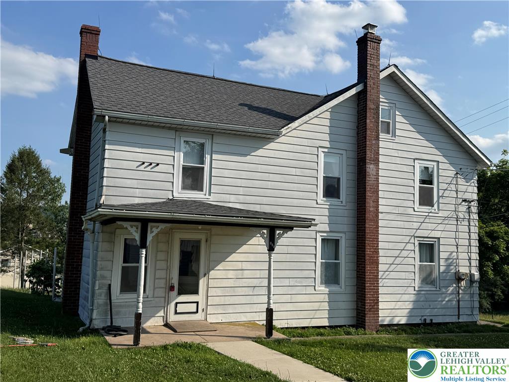 868 Catawissa Road Tamaqua, PA 18252 - Photo 6 of 67 A classic two-story residence with a welcoming covered front porch awaits your personal touch.