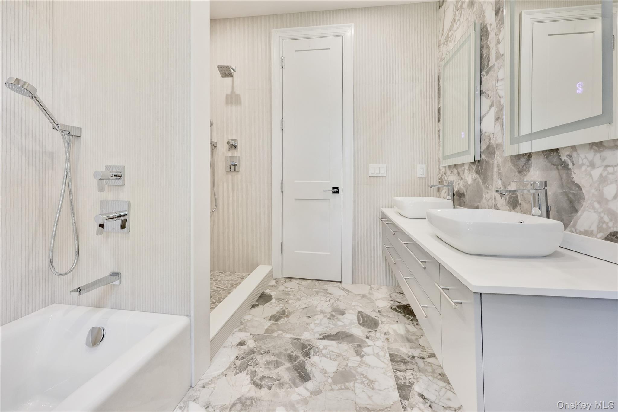 8 Sealy Drive Lawrence, NY 11559 - Photo 14 of 49 Full bathroom featuring double vanity and light marble finish floors