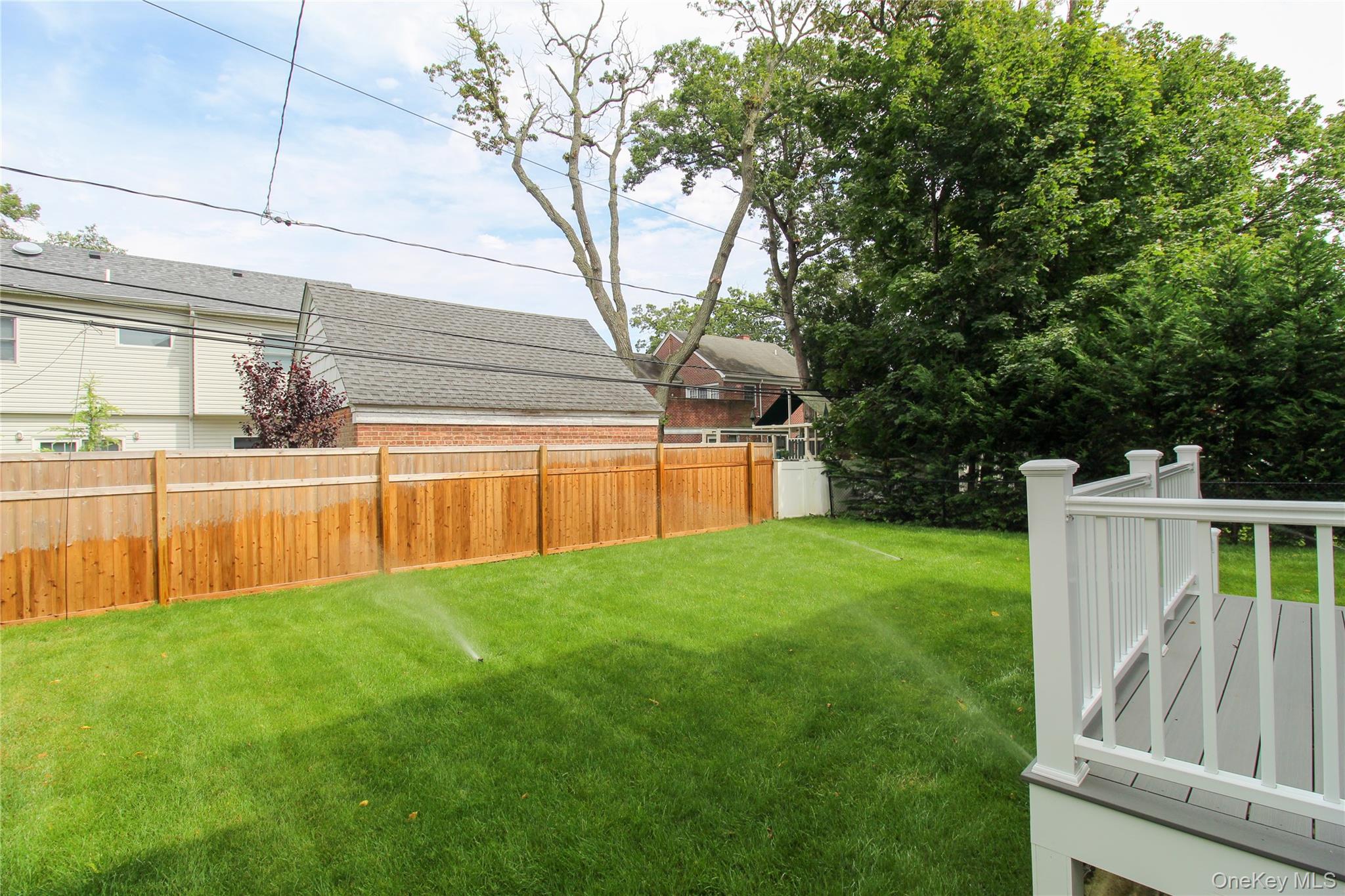 8 Sealy Drive Lawrence, NY 11559 - Photo 37 of 49 View of fenced backyard