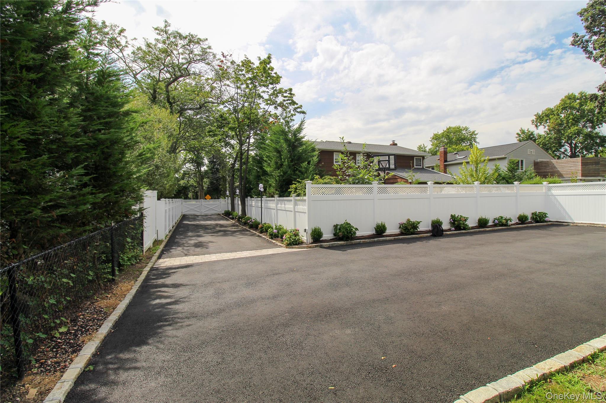 8 Sealy Drive Lawrence, NY 11559 - Photo 39 of 49 View of asphalt road