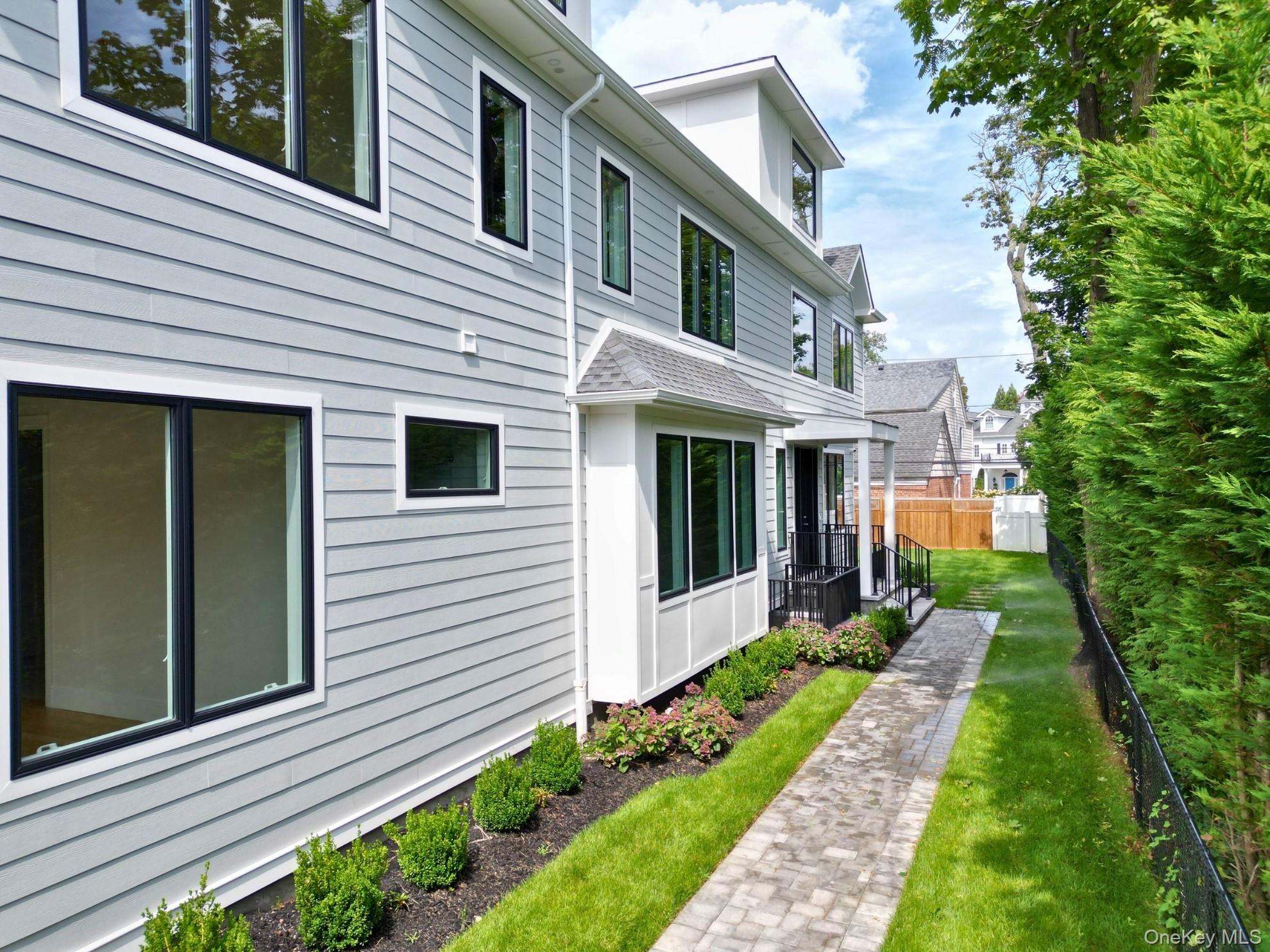 8 Sealy Drive Lawrence, NY 11559 - Photo 43 of 49 View of property exterior