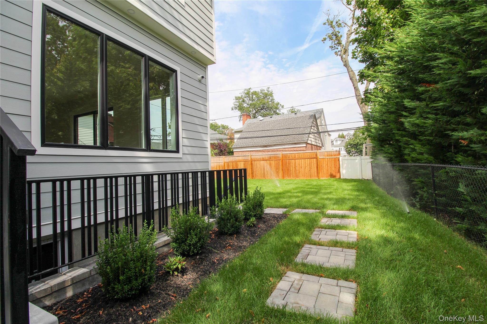 8 Sealy Drive Lawrence, NY 11559 - Photo 5 of 49 View of fenced backyard