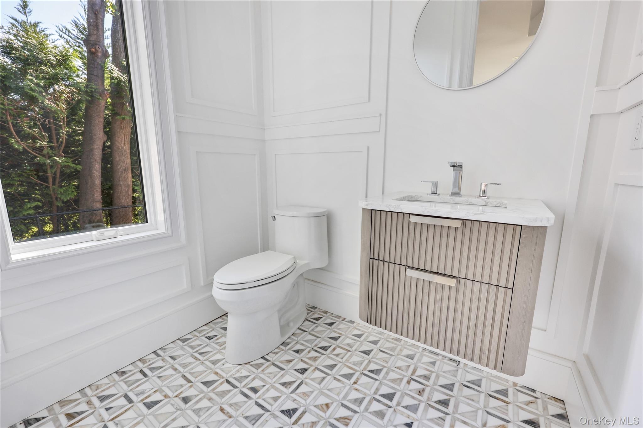 8 Sealy Drive Lawrence, NY 11559 - Photo 6 of 49 Bathroom featuring vanity and a decorative wall