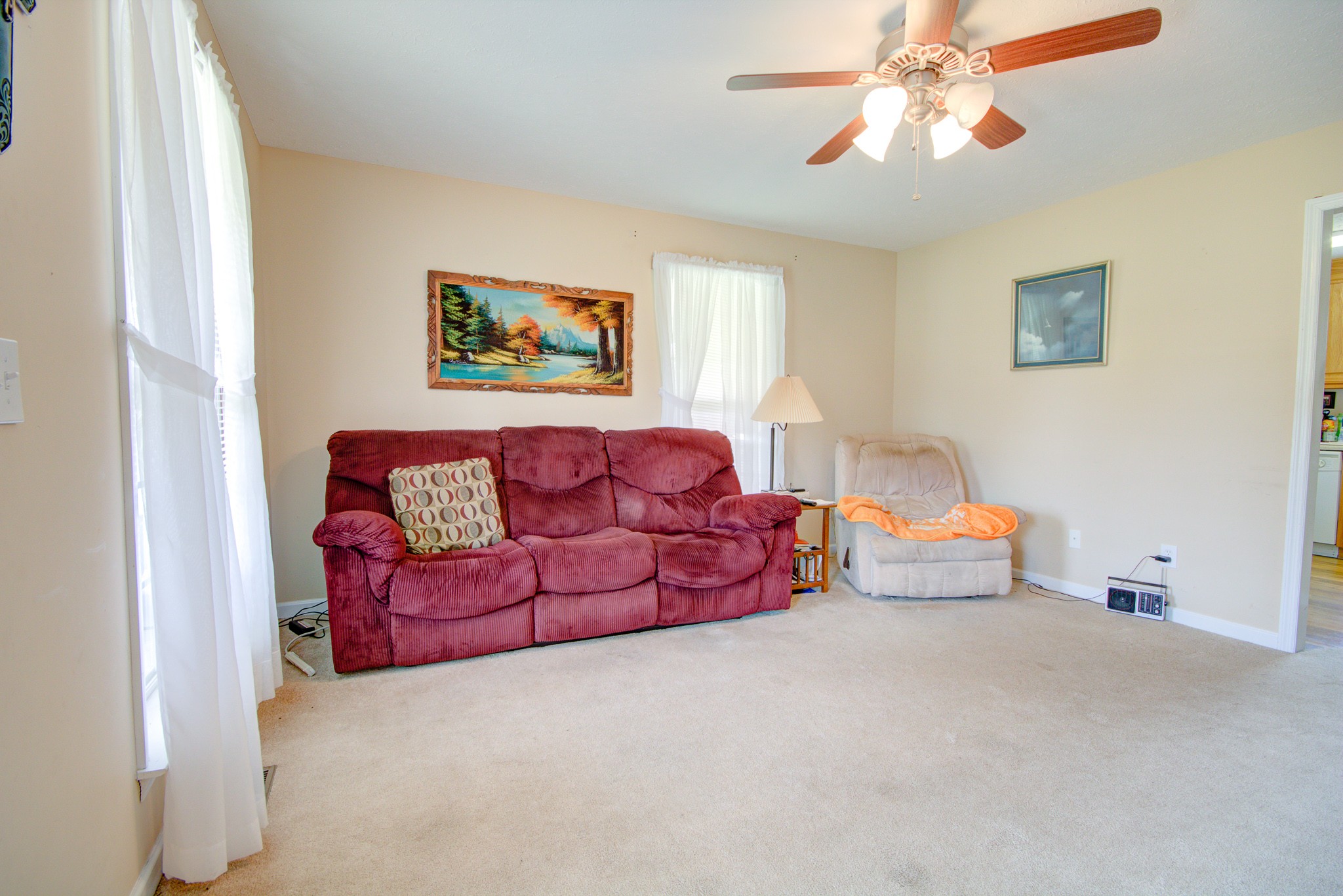236 East Prospect Road Fayetteville, TN 37334 - Photo 8 of 29 a living room with furniture and a chandelier