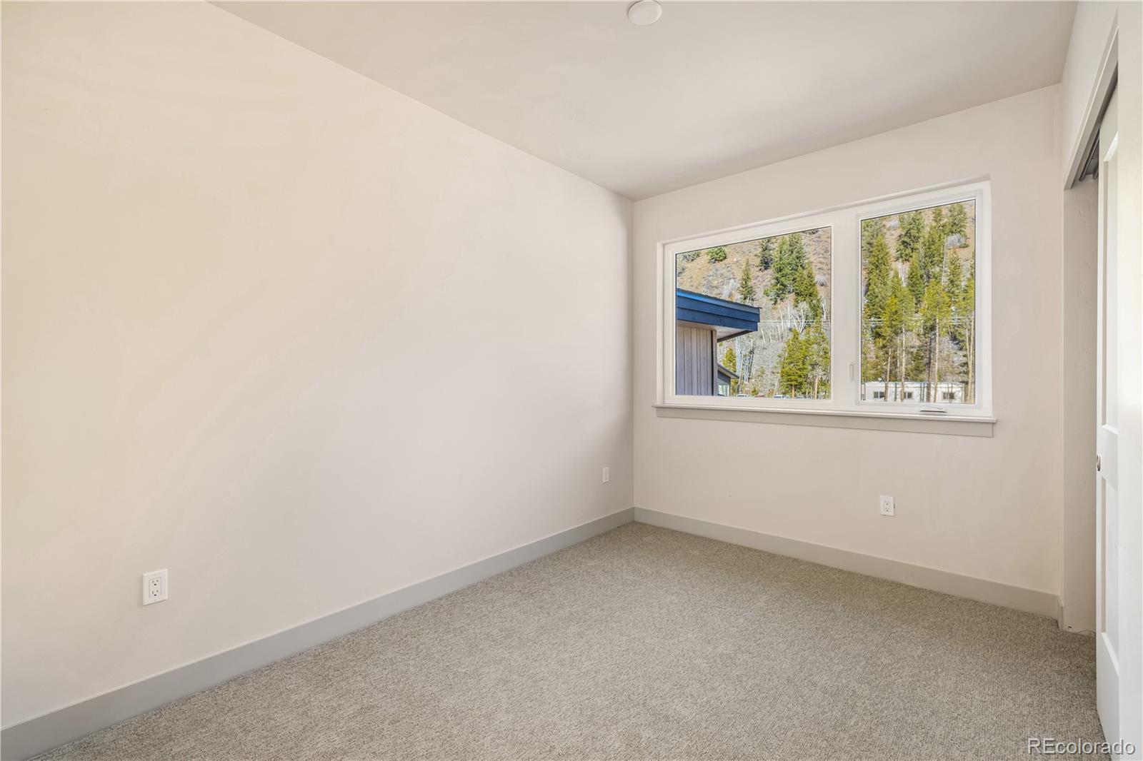624 Montezuma Road, Unit D2 Keystone, CO 80435 - Photo 16 of 31 an empty room with a window