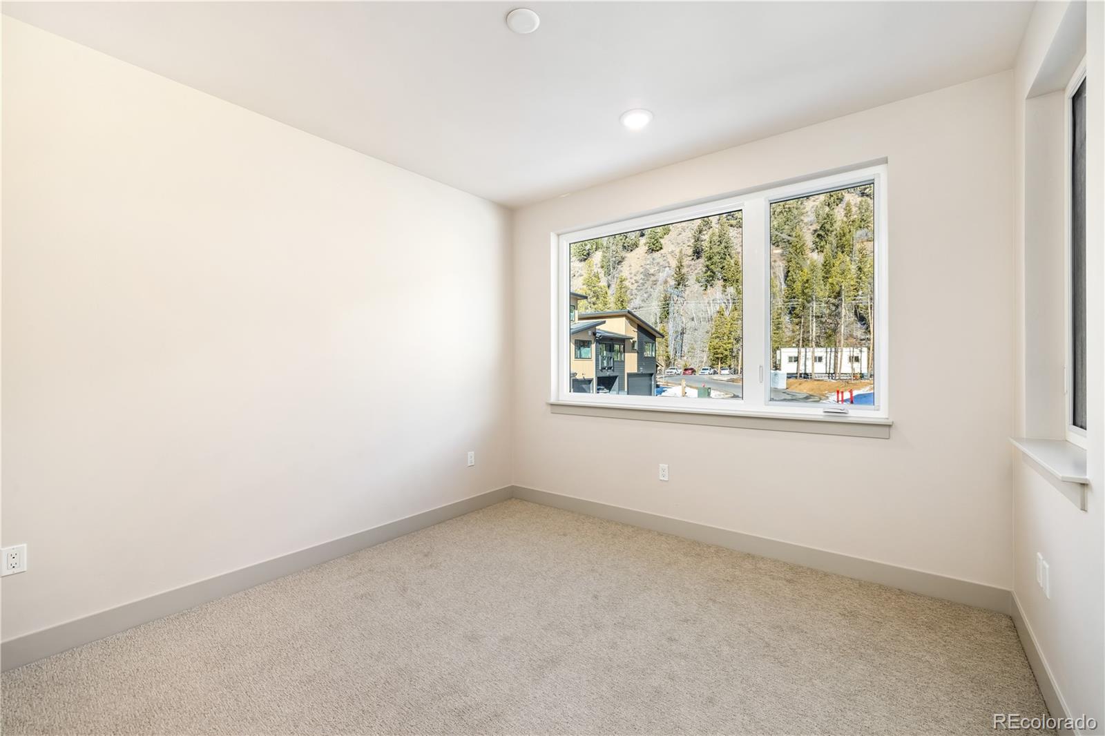624 Montezuma Road, Unit D2 Keystone, CO 80435 - Photo 9 of 31 an empty room with windows