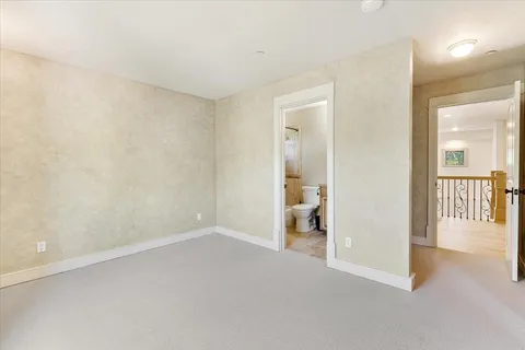 a bathroom with a double vanity sink a mirror and a shower