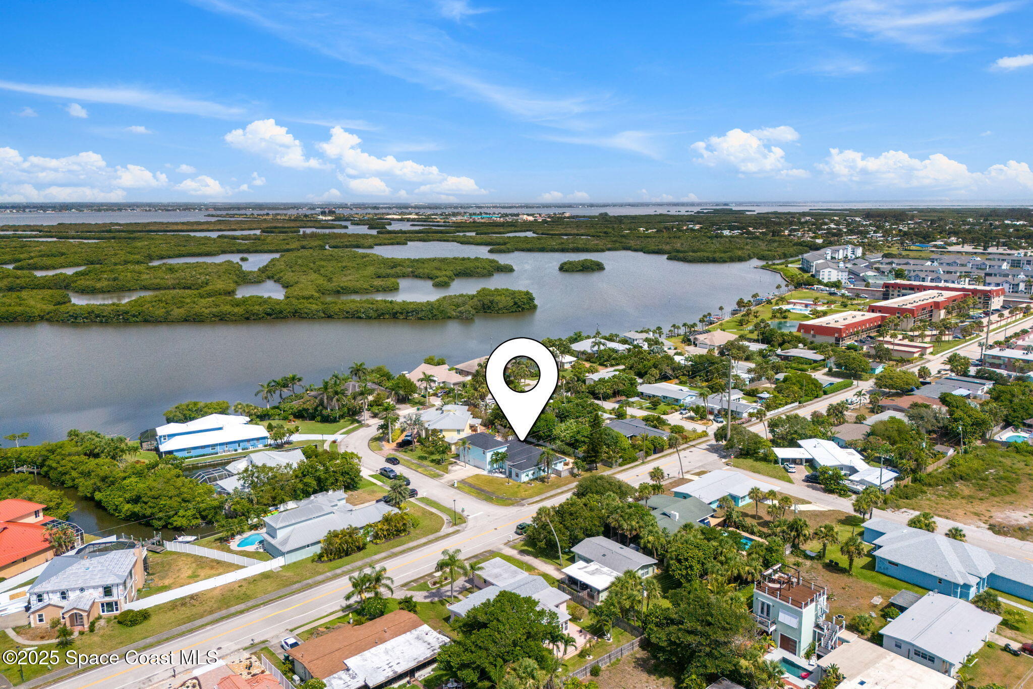 48 Harbor Circle Cocoa Beach, FL 32931 - Photo 2 of 48 a view of a city with lake view