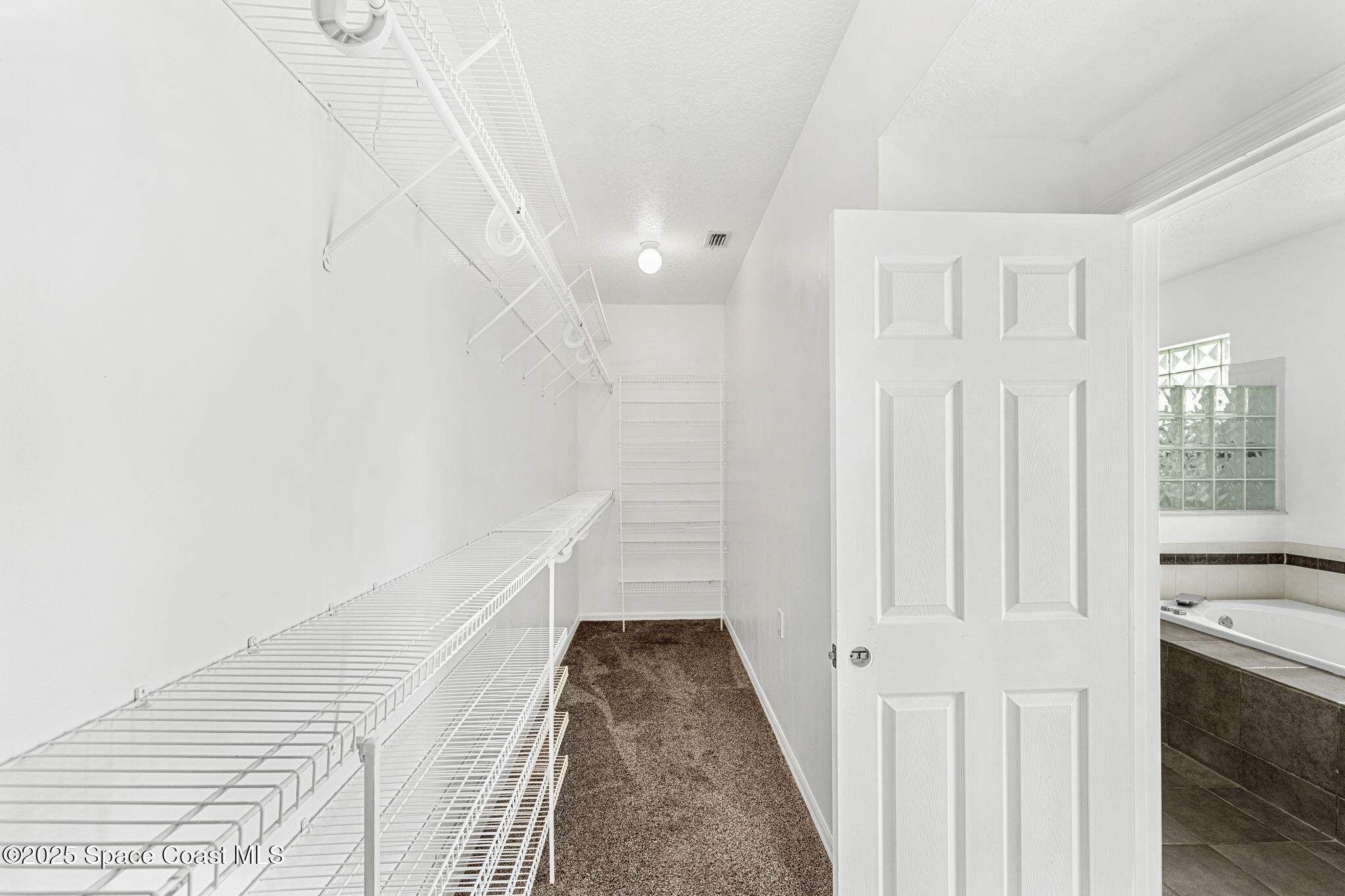48 Harbor Circle Cocoa Beach, FL 32931 - Photo 27 of 48 a view of a livingroom with wooden floor