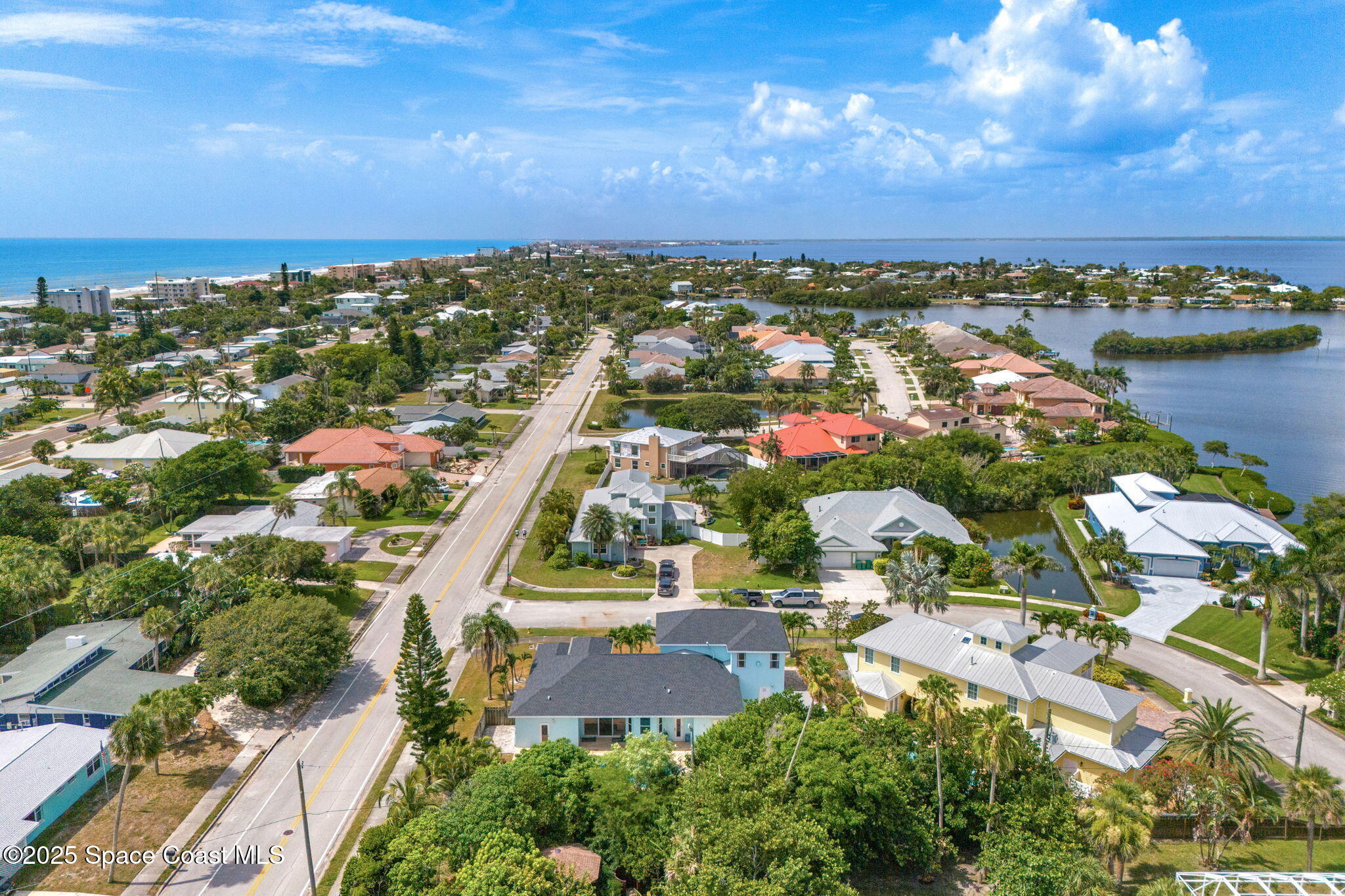 48 Harbor Circle Cocoa Beach, FL 32931 - Photo 45 of 48 an aerial view of residential houses with outdoor space