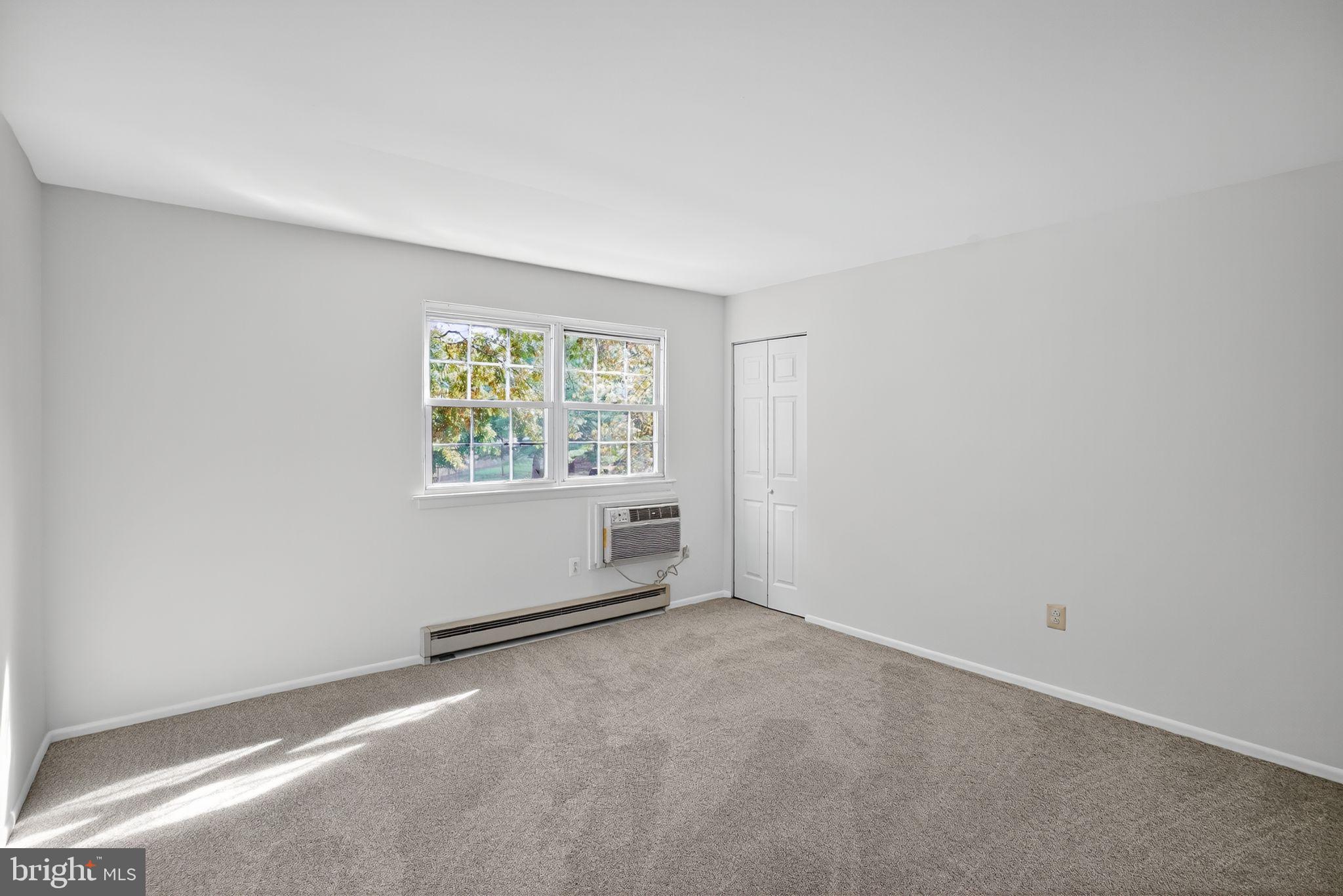 178 Elephant Road, Unit A6 Dublin, PA 18917 - Photo 13 of 17 an empty room with windows