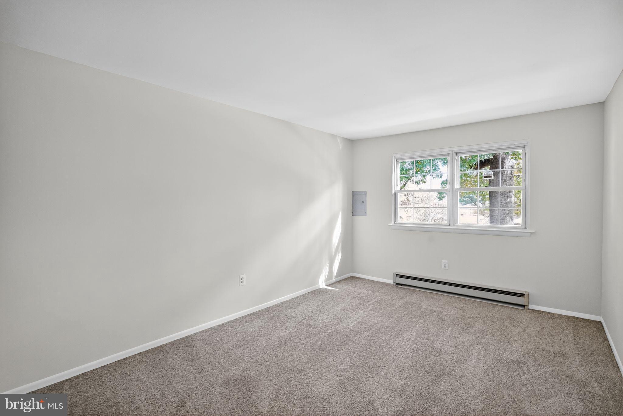 178 Elephant Road, Unit A6 Dublin, PA 18917 - Photo 17 of 17 an empty room with windows