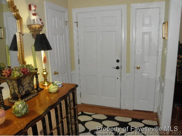 2723 Huntington Road Fayetteville, NC 28303 - Photo 2 of 25 a bathroom with a sink a toilet and shower